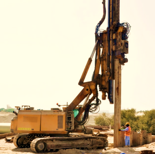 Sheet pile shoring system installed to support excavation, providing soil stability and safe working conditions at a UAE construction site